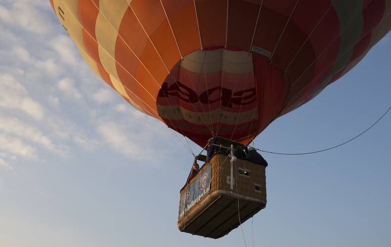 Hot-air Balloon with a payload of instruments is taking off.  