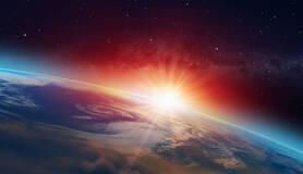 Aarde bezien vanuit de ruimte met opkomende zon