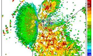 Radarbeeld vanuit Den Helder van schrikreactie van vogels op vuurwerk kort na jaarwisseling 2014-2015. © KNMI