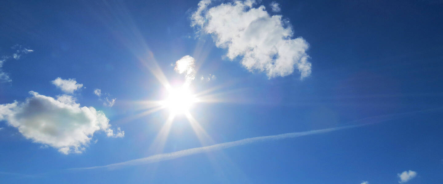 Foto van zon en wolken